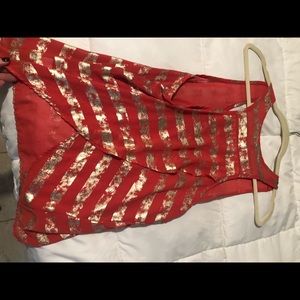 Gold and coral tank